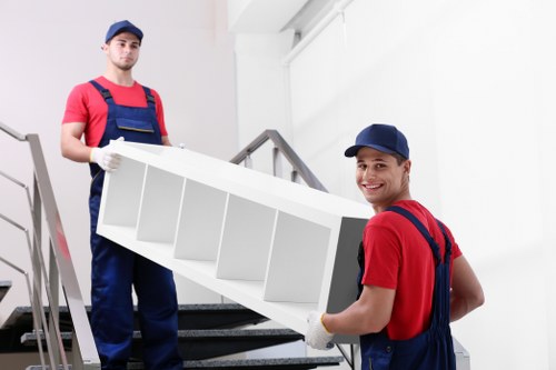 Local crew collecting household furniture from an Eastcote home
