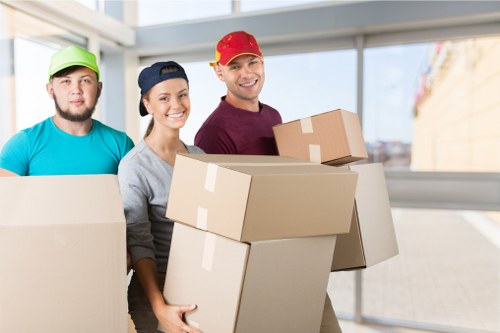 Movers handling a flat move with stairs and access considerations