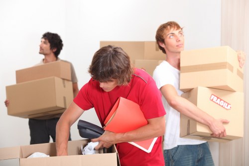 Furniture and boxes being loaded into a van for an Eastcote collection