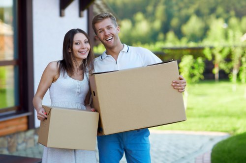 Packing and loading household items into a removals van