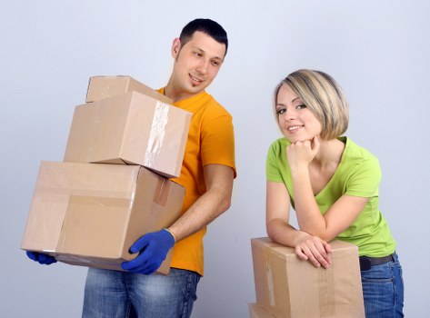 Local movers loading a van near Eastcote residential street