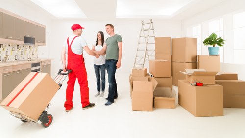 Removal team handling household items for an Eastcote relocation